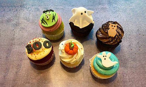 Box of 6 Halloween cupcakes with monster, ghost, owl, BOO and pumpkin toppers